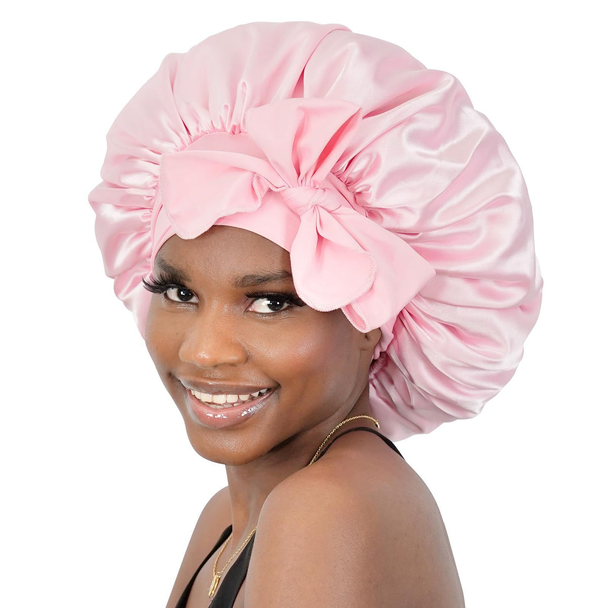 Pink satin sleep bonnet for women and girls, adjustable silk hair bonnet, part of girls' sleepwear by Everything Baby.