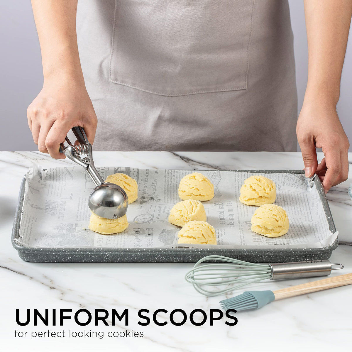 Social Chef stainless steel small cookie scoop for perfect cookie-sized cookies and small ice cream servings, ideal for baking and feeding.