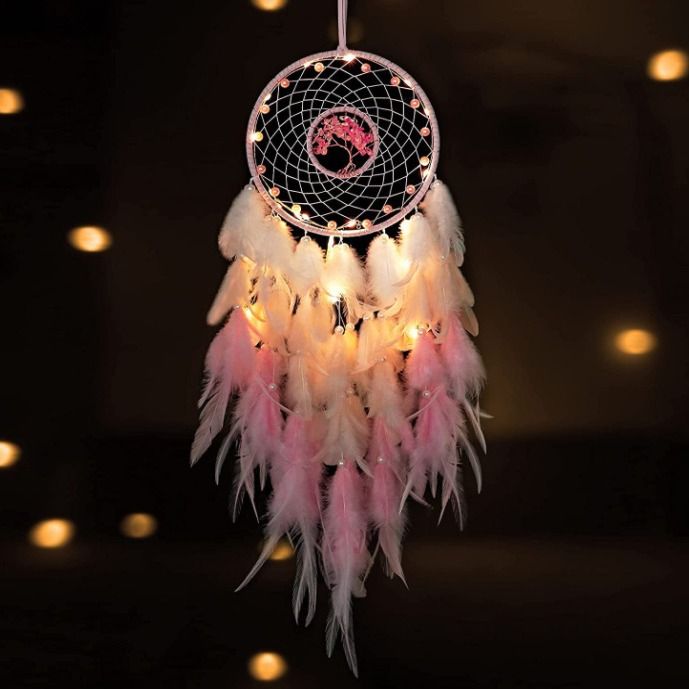 Pink dream catcher with crystal accents for girls' room decor, featuring a tree of life design for kids' pretend play and bedroom decoration
