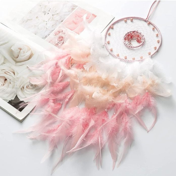Pink dream catcher with crystal accents, tree of life design, perfect for girls' or kids' bedroom decor and pretend play.