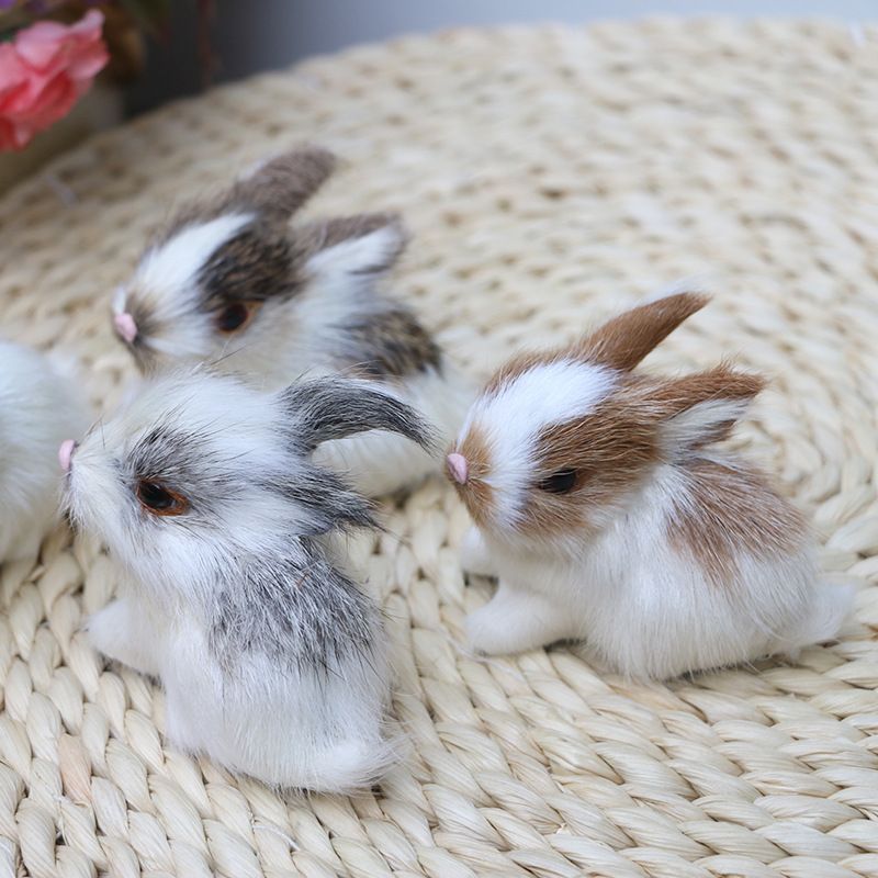 Set of 4 realistic plush baby rabbits, soft furry Easter bunny figurines for kids' pretend play and birthday gifts.