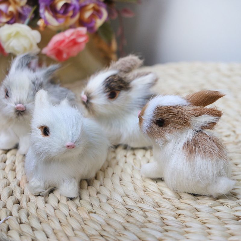 Set of four realistic plush bunny figurines by Everything Baby, soft furry Easter and birthday toy for kids' pretend play.