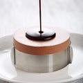 Adjustable stainless steel cake mold ring with sliding design, ideal for baking and cake decorating, by Everything Baby.