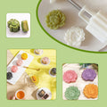 Stamped mooncake press mold with flower design, used for DIY mooncake desserts and puff pastry baking, suitable for creative baking projects.