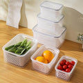 Baby fruit container set with removable colander, leak-proof design, and stackable features for nursing and feeding.