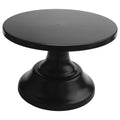 Black metal iron round cake stand with pedestal base, used for displaying desserts, suitable for outdoor play and events.