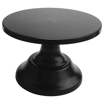 Black metal iron round cake stand with pedestal base, used for displaying desserts, suitable for outdoor play and events.
