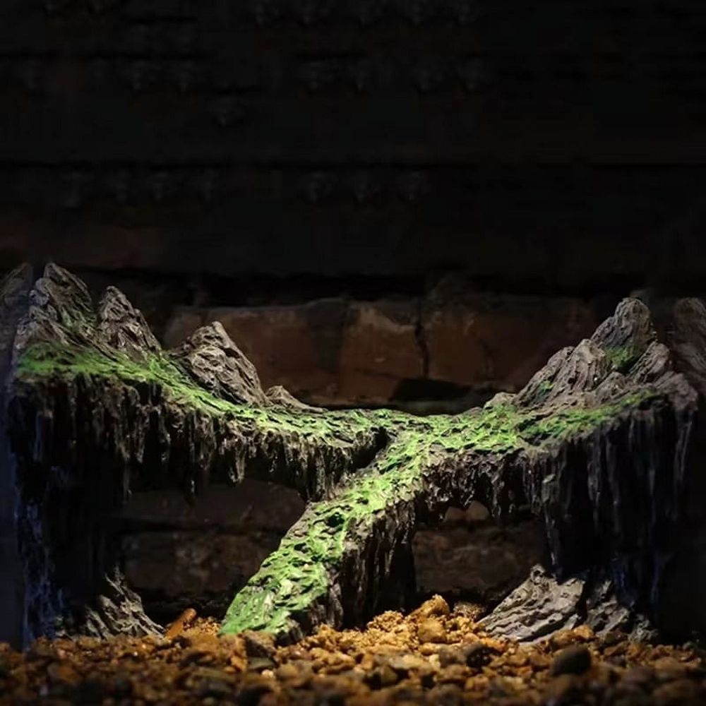 Colorful resin aquarium decoration with simulated rock mountain and cave for fish tank hide and play, by Everything Baby.