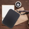 Black metal tin with lid for storing game cards and accessories, ideal for organizing kids' backpacks and small items.