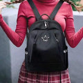 Women's water-repellent anti-theft backpack with large capacity, convertible shoulder strap, stylish design for travel, work, and outdoor use.