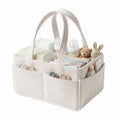 Large corduroy nursery diaper storage basket with handle and adjustable dividers, ideal for baby supplies organization.