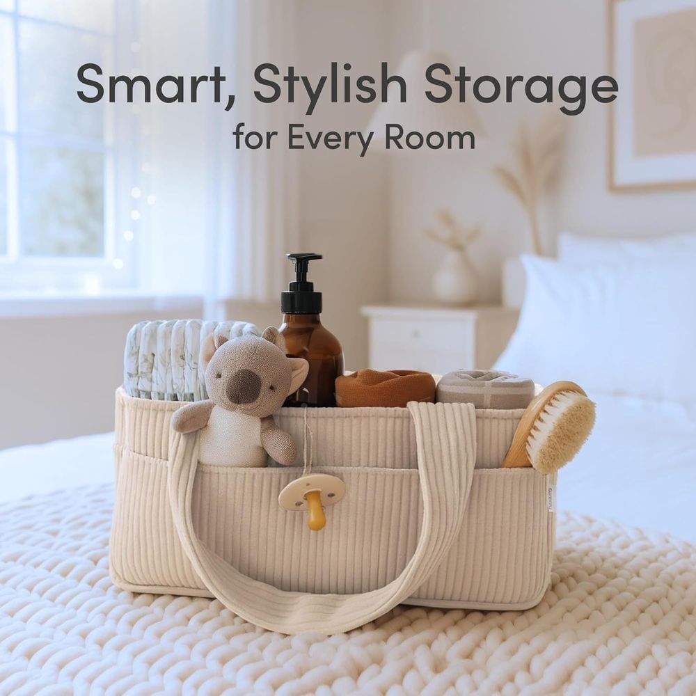 Portable corduroy nursery diaper storage basket with handle, adjustable dividers, large capacity for baby supplies organization.