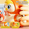 Wind-up chicken toy for kids, featuring a swinging, walking hen and chick, suitable for pretend play and learning activities.