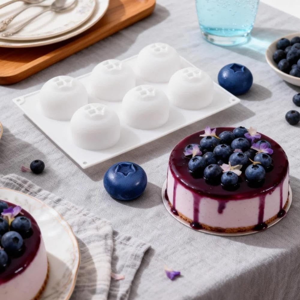 Blueberry silicone baking mold with six cavities, non-stick, heat resistant, BPA-free bakeware for muffins, cupcakes, and desserts.