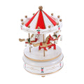 Red carousel music box by Everything Baby with mechanical movement, ideal as a musical toy for kids and babies.