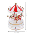 Red carousel music box by Everything Baby with mechanical movement, suitable for kids, featuring colorful carousel design.