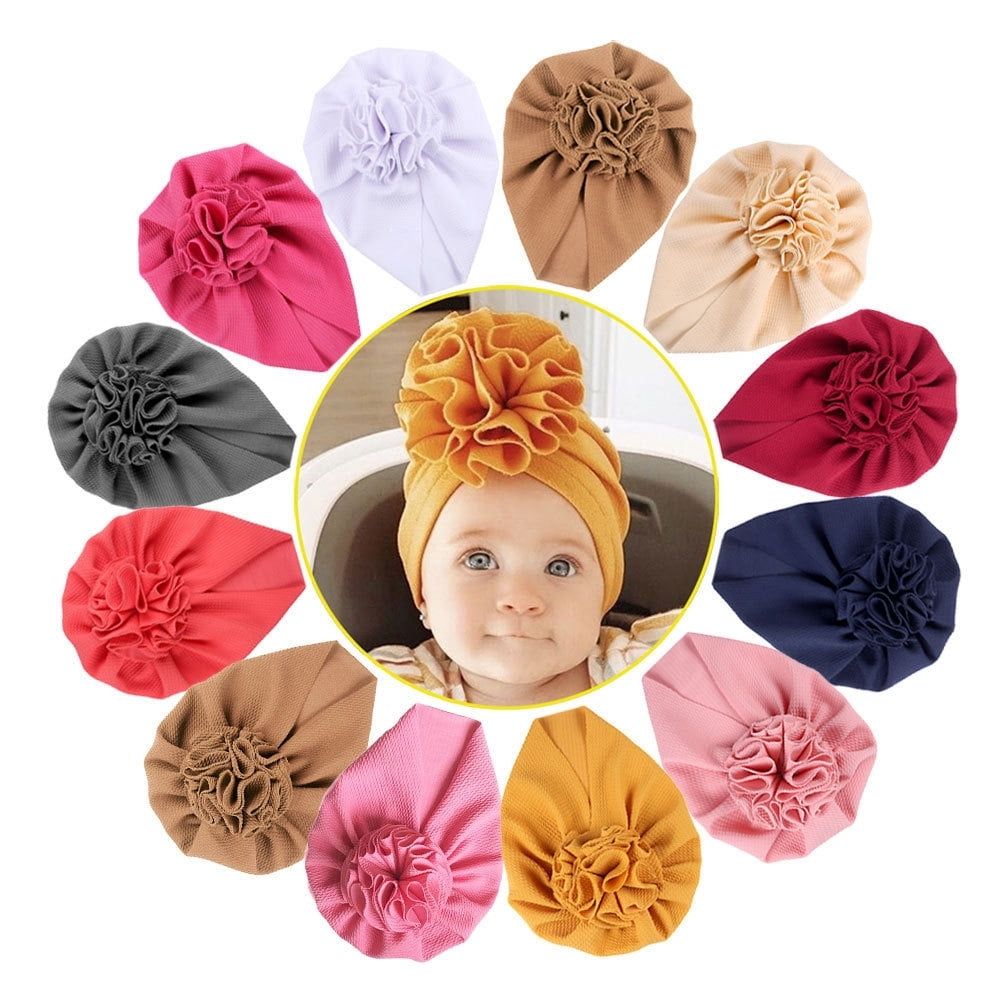 Baby girl hats with big flower bow, soft beanies and headwraps from Everything Baby, perfect for infants and toddlers.