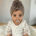 Baby girls' hat with big flower bow, soft beanie headwrap for infants and toddlers, by Everything Baby
