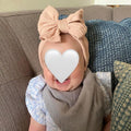 Six handmade baby headbands with double bows, nylon hair accessories for newborns, infants, toddlers, and kids by Everything Baby.