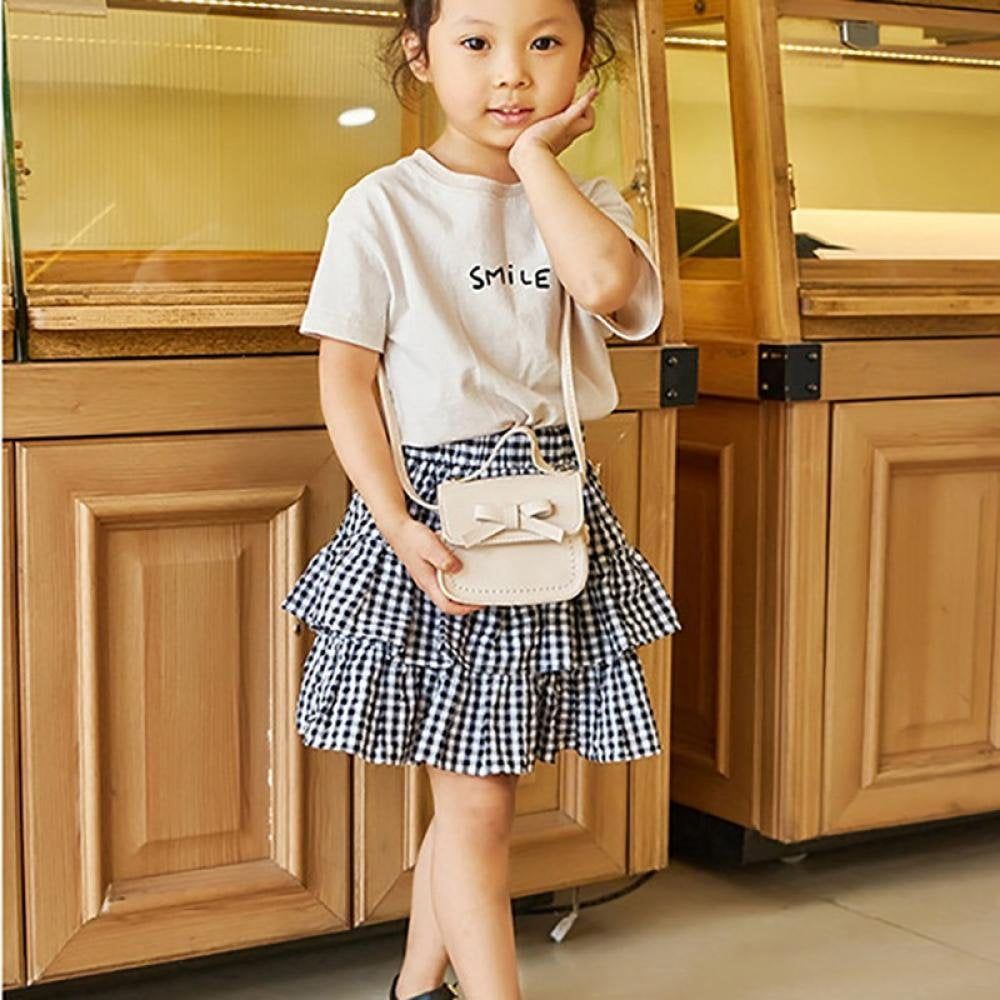 Cute kids' bow-shaped shoulder bag by Everything Baby, featuring a mini design and adorable pattern for little girls.