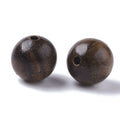 Set of 100 natural waxed wooden beads in coconut brown, 8mm round with 1.5mm hole, ideal for kids' outdoor play and craft projects.