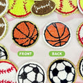 Set of 16 sports-themed iron-on patches featuring basketball, soccer, baseball, football, and volleyball designs for kids' shirts.