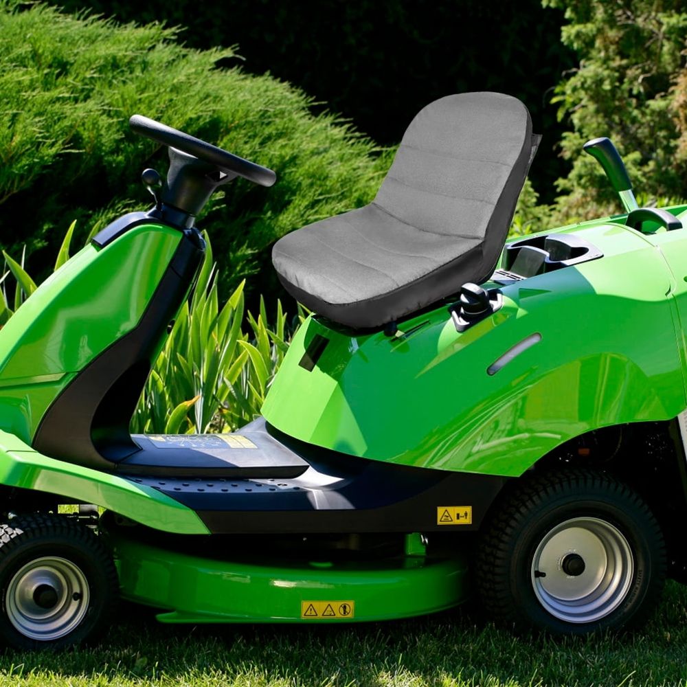 Waterproof lawn mower seat cover made of 600D Oxford cloth with pocket, fits 12.5-14 inch tractor seats without armrests.