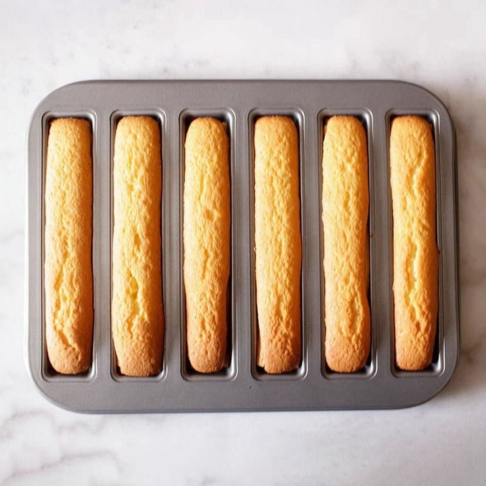 Mini 3D biscuit stick mold baking pan by Everything Baby, carbon steel, non-stick surface, for cake and bread baking.
