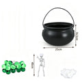 Witch cauldron decoration with skeleton figure, glowing green bubbling liquid, hanging on black metal tripod for Halloween decor