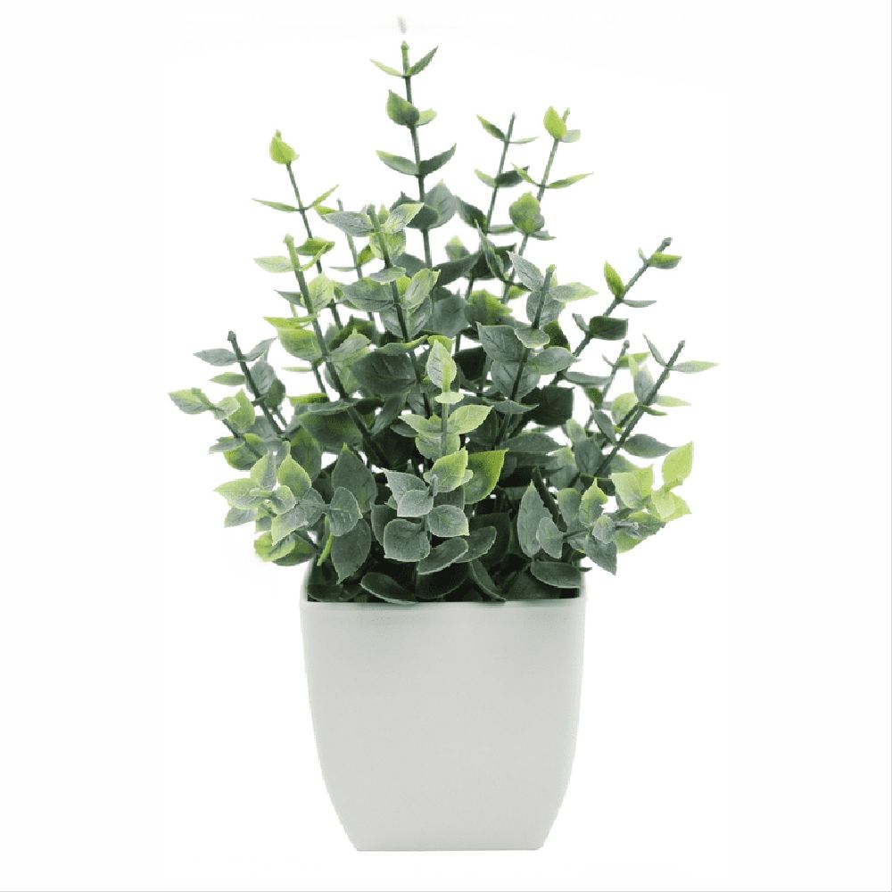 Artificial indoor plant with green leaves in a modern white pot, ideal for desk or home decor, from Everything Baby.