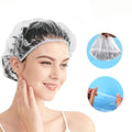 Clear plastic disposable shower caps for women, men, and kids, waterproof, large, thick, suitable for spa, travel, and deep conditioning.