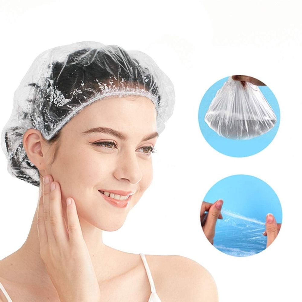 Clear plastic disposable shower caps for women, men, and kids, waterproof, large, thick, suitable for spa, travel, and deep conditioning.