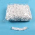 Clear plastic disposable shower caps for women, men, and kids, large, waterproof, ideal for spa, bath, or travel use.