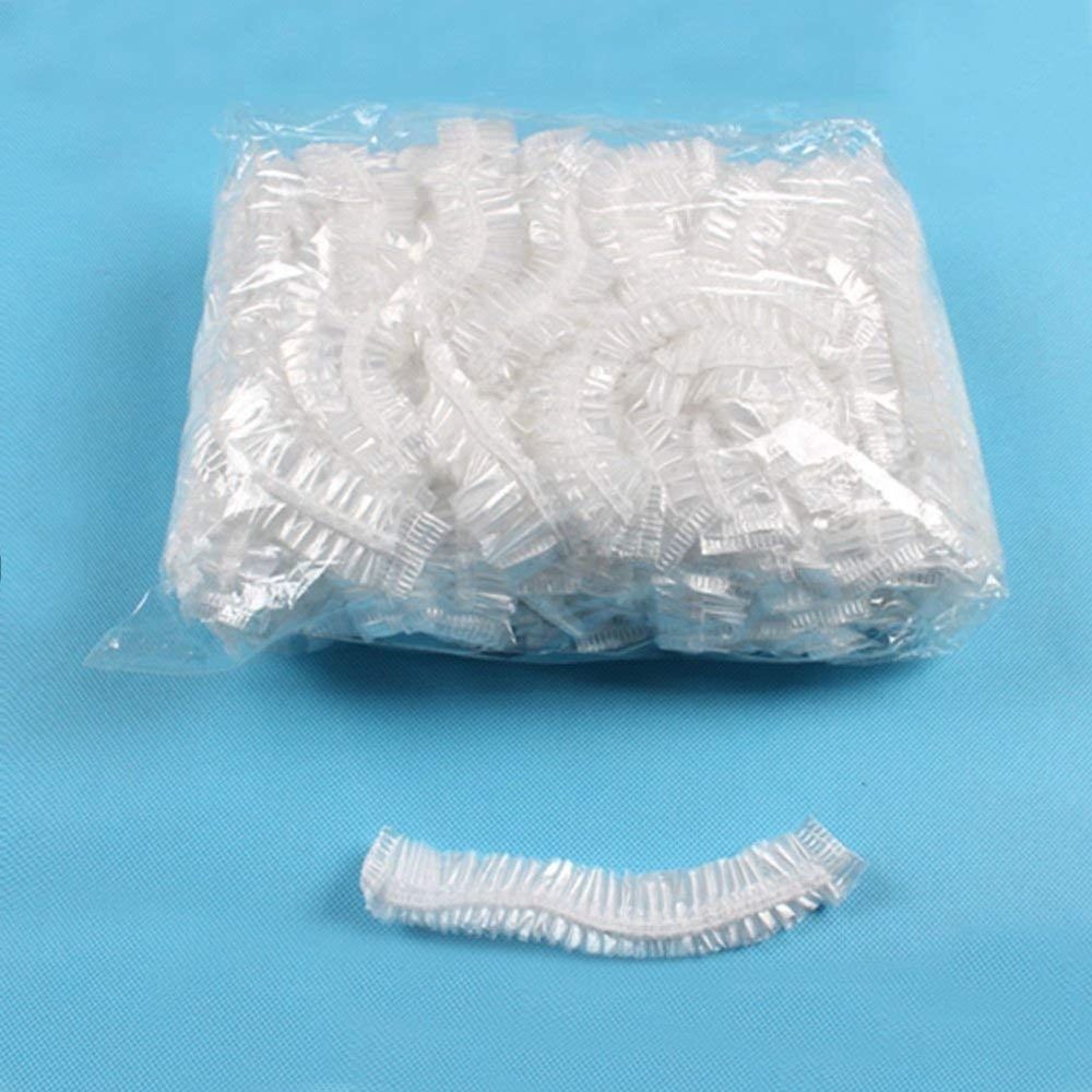 Clear plastic disposable shower caps for women, men, and kids, large, waterproof, ideal for spa, bath, or travel use.