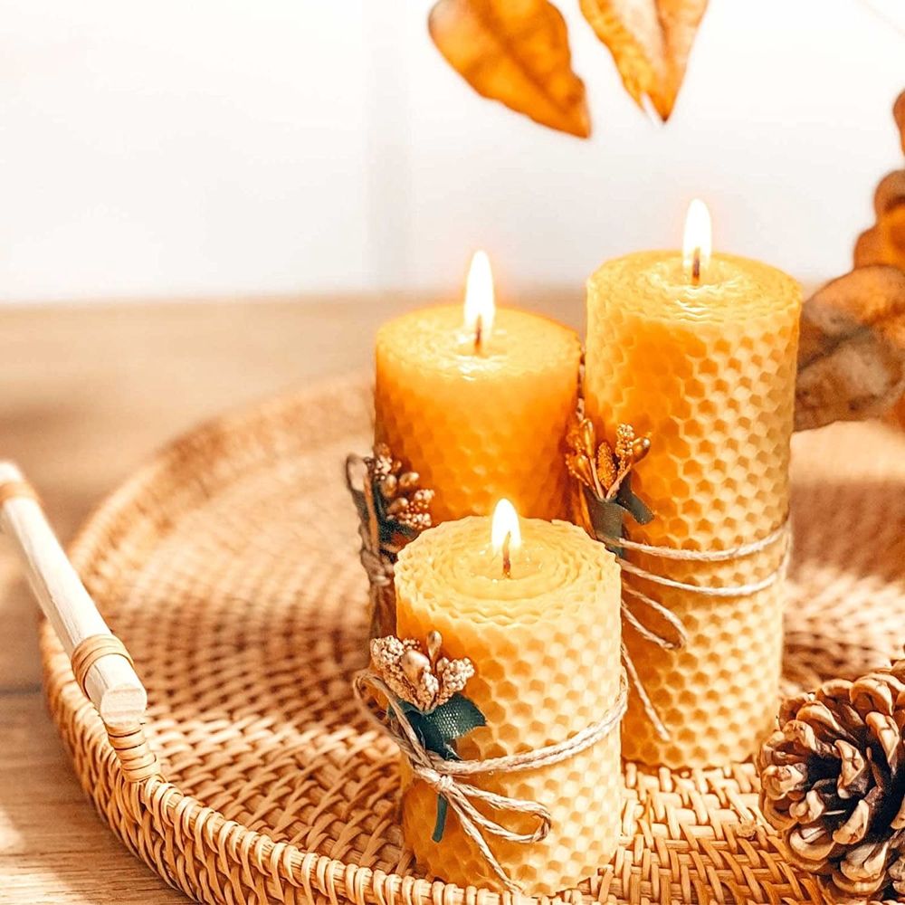 Small round rattan bread basket with wooden handle, handcrafted woven serving tray for coffee table or party decor.