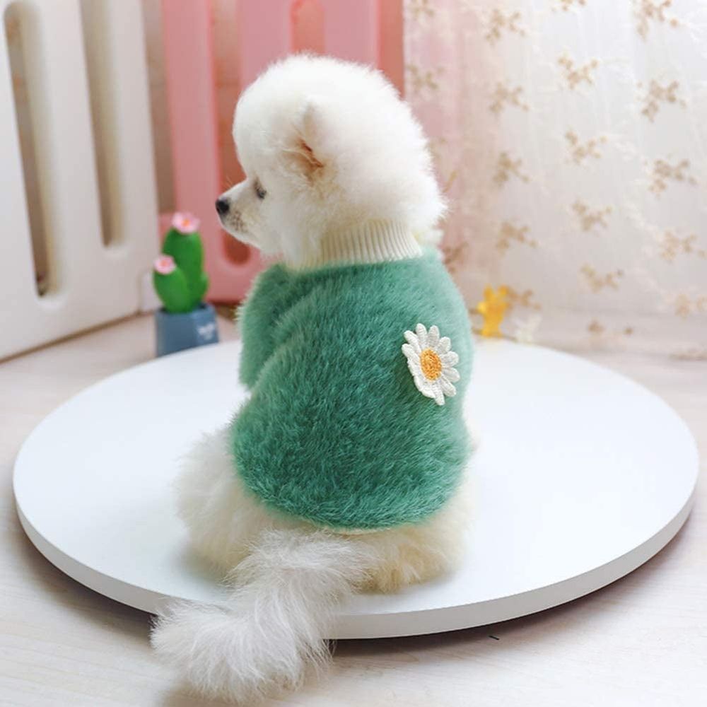Pink plush dog sweater with daisy print, round neck, floral design, warm fleece for small dogs in autumn and winter.