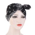 Pink bow turban beanie for girls from Everything Baby, cozy sleepwear bonnet with soft fabric and cute design.