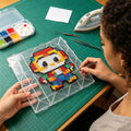 Clear 11x11 inch fuse beads pegboard by Everything Baby, plastic square board for DIY craft and creative building projects.