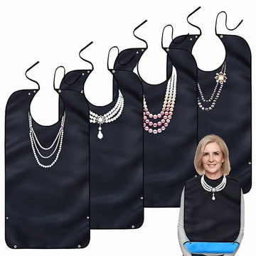 Set of four reusable adult bibs for women, waterproof and washable with crumb catchers, designed for dining and feeding comfort.