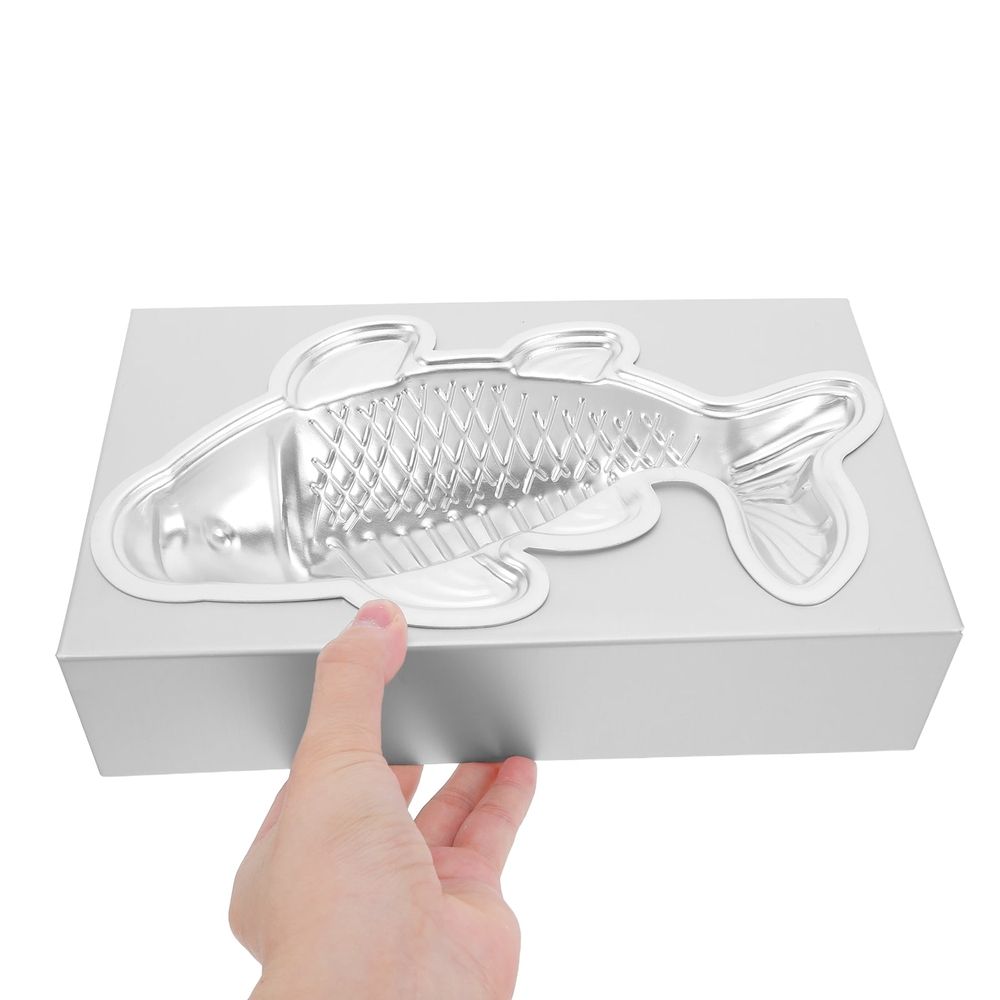Nonstick fish-shaped mold for mousse cakes, chocolate, and baking, designed for kids' pretend play and baking activities.