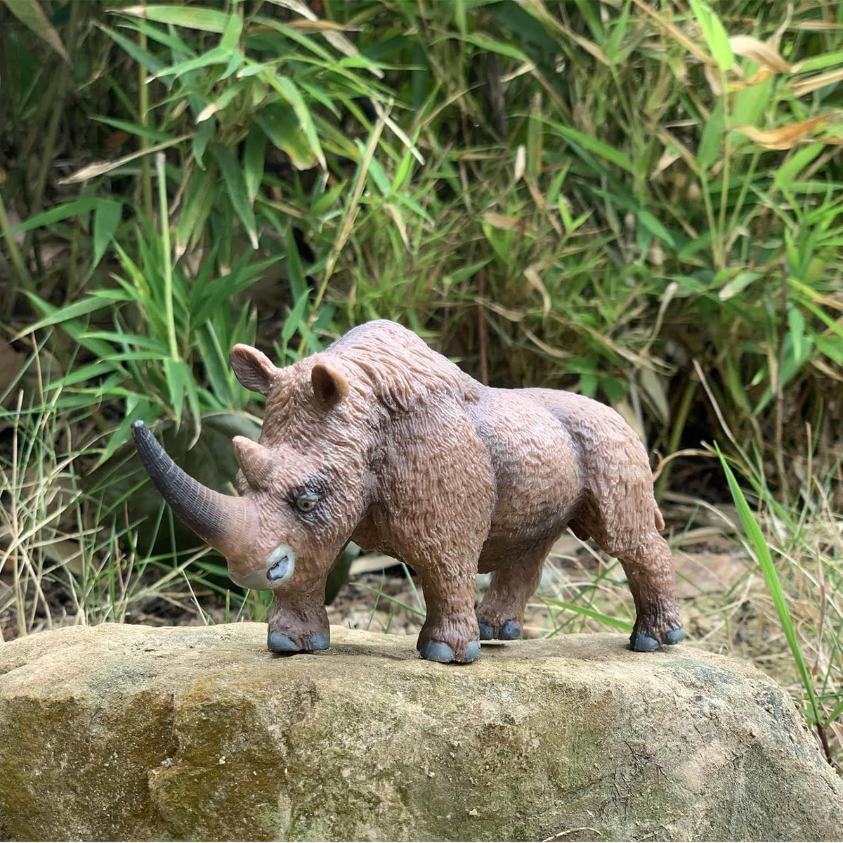 Woolly rhinoceros toy from Ancient Creatures collection by Everything Baby, suitable for pretend play and educational decor.