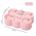 Pink silicone mini popsicle molds shaped like cute baby animals, perfect for making DIY ice pops for kids.