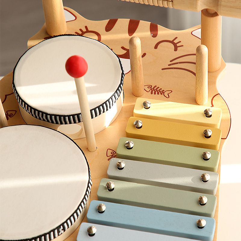 Children's 7-in-1 drum set by Everything Baby with colorful drums and cymbals, perfect for toddlers' musical play and learning.