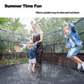 Outdoor trampoline water sprinkler for kids, 26ft long, used for water play, summer fun, and outdoor games in yards.