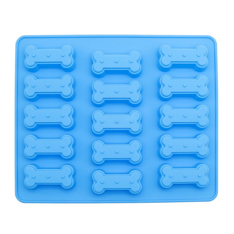Two silicone pet treat molds shaped like small bones for homemade dog and cat treats, perfect for baking chocolates or candies.