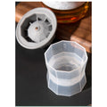 Large silicone ice cube tray with cover, designed for household ice storage and ice-making, suitable for home use.