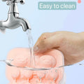 Silicone bear-shaped ice mold for reusable, fun cartoon ice cubes, ideal for coffee, whiskey, cocktails, and wine.