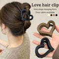 Set of four matte acrylic heart-shaped hair claw clips for women, stylish nonslip hair accessories for Valentine’s Day.