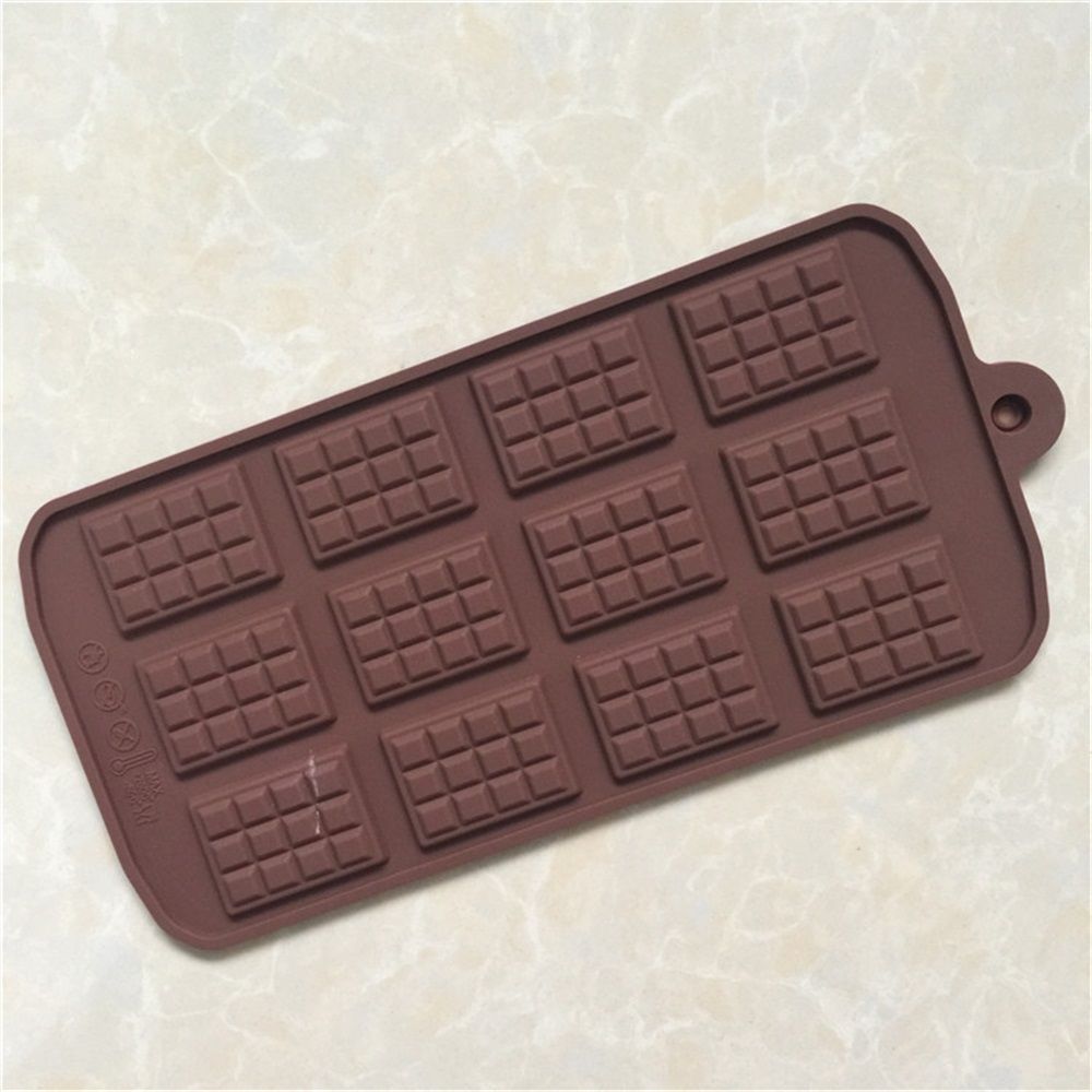 Silicone waffle chocolate molds with 12 cavities for DIY candy and baking, reusable and non-stick, suitable for kids' treats.