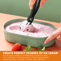 Black ice cream scoop with comfortable grip handle, heavy-duty stainless steel, perfect shape for serving ice cream.
